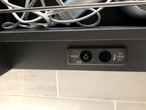 洗面台の照明のボタン